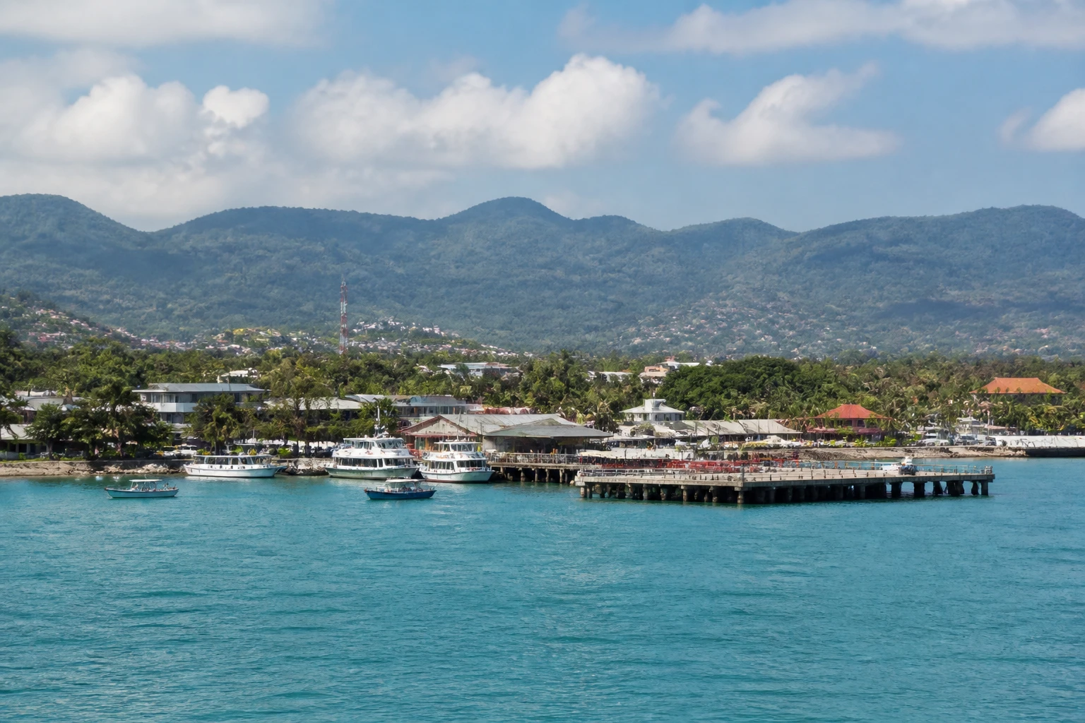 Representative cruise port destination view: Ko Samui, Thailand; passenger waterfront and harbor water, not an exact landmark photograph.