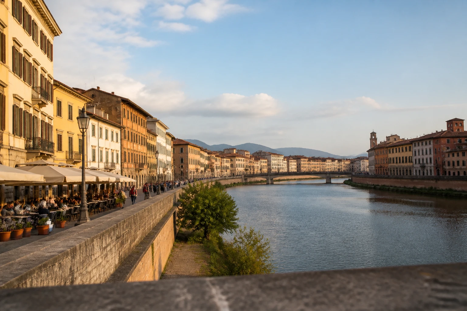 Representative historic city destination view: Pisa, Italy; heritage-scale streetscape and regional architecture, not an exact landmark photograph.