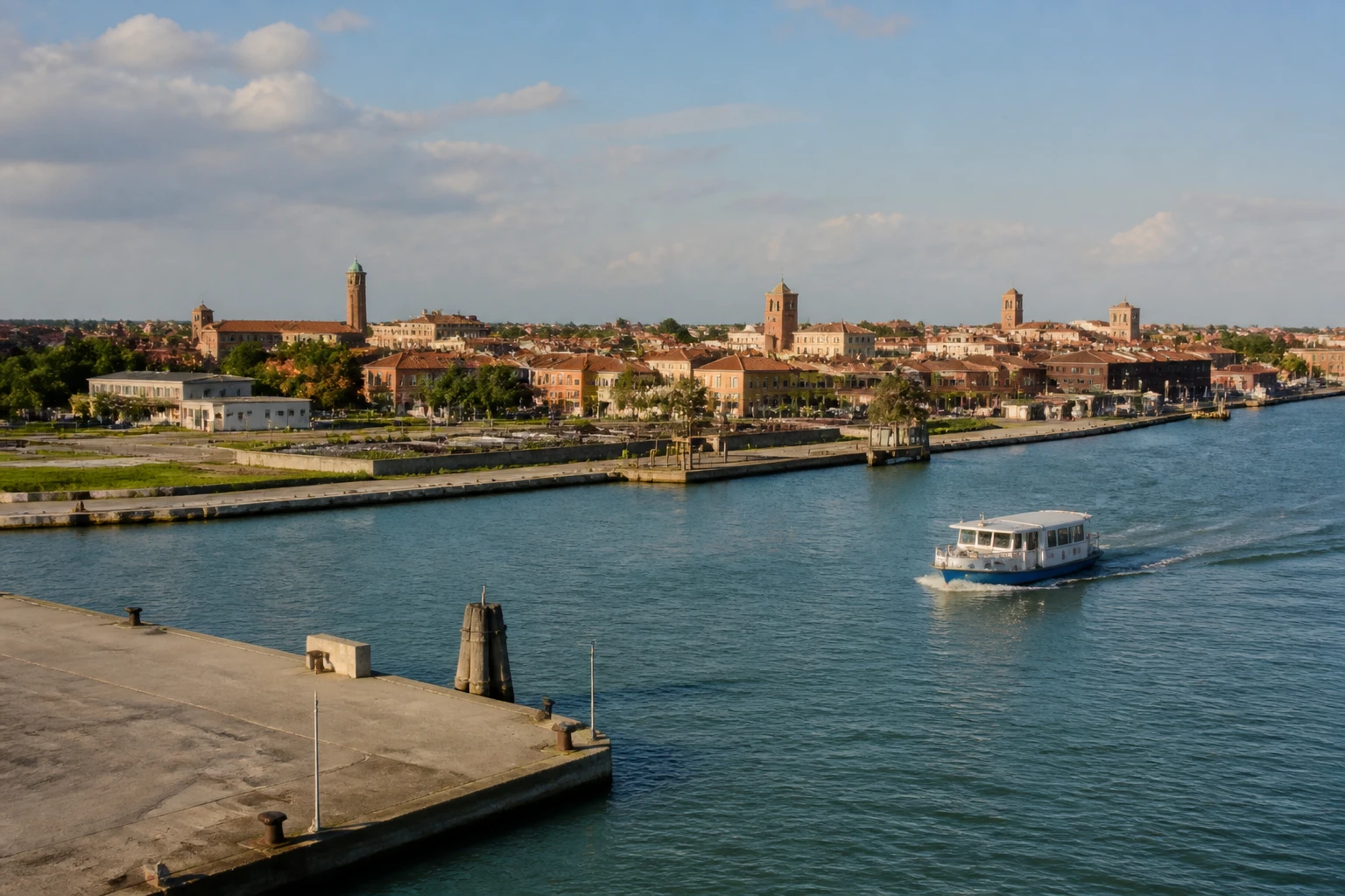 Representative cruise port destination view: Ravenna, Italy; passenger waterfront and harbor water, not an exact landmark photograph.