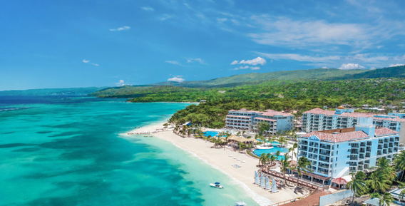 Representative resort exterior imagery for a Sandals Dunn’s River destination wedding in Jamaica