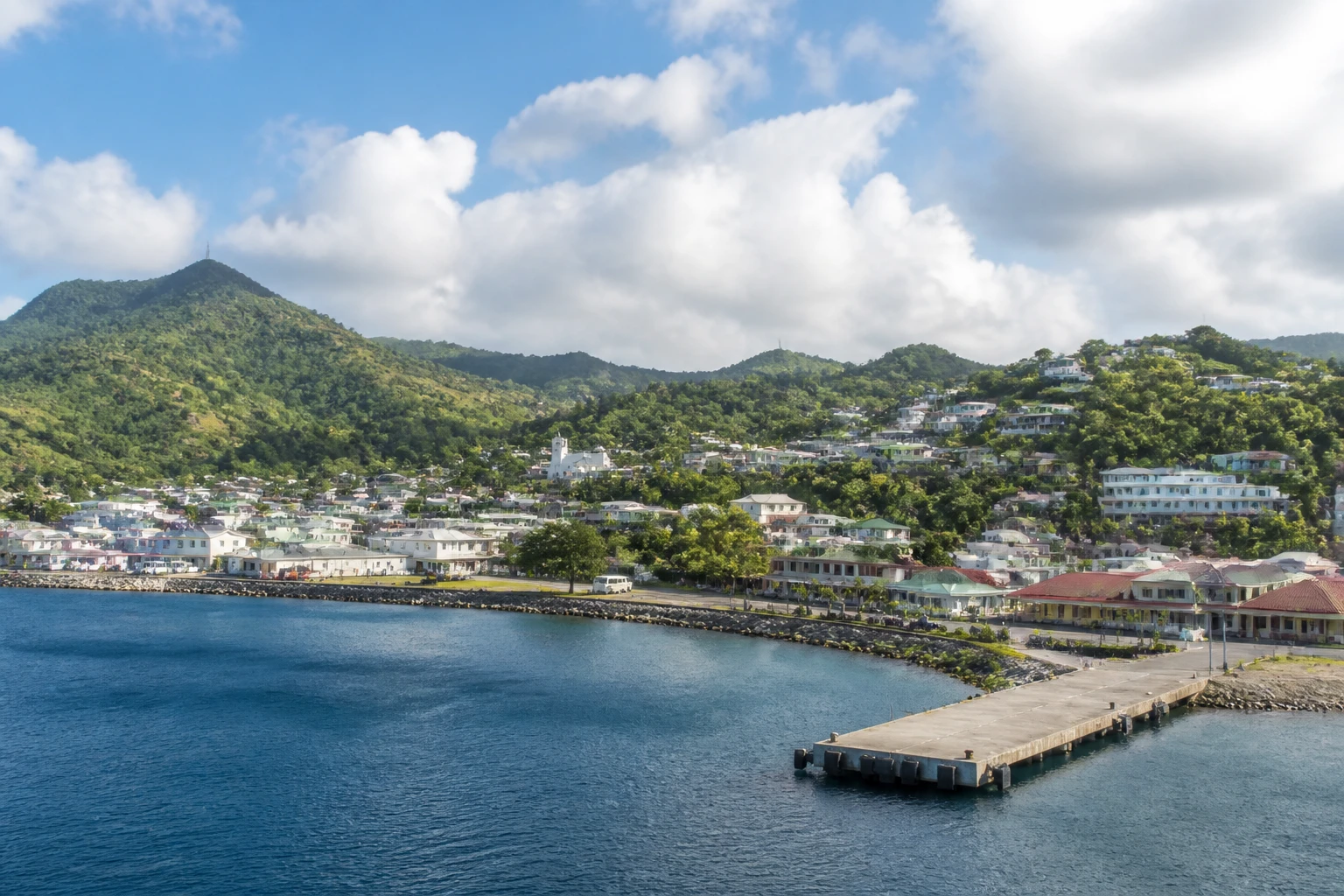 Representative cruise port destination view: Port Elizabeth, Saint Vincent and the Grenadines; passenger waterfront and harbor water, not an exact landmark photograph.