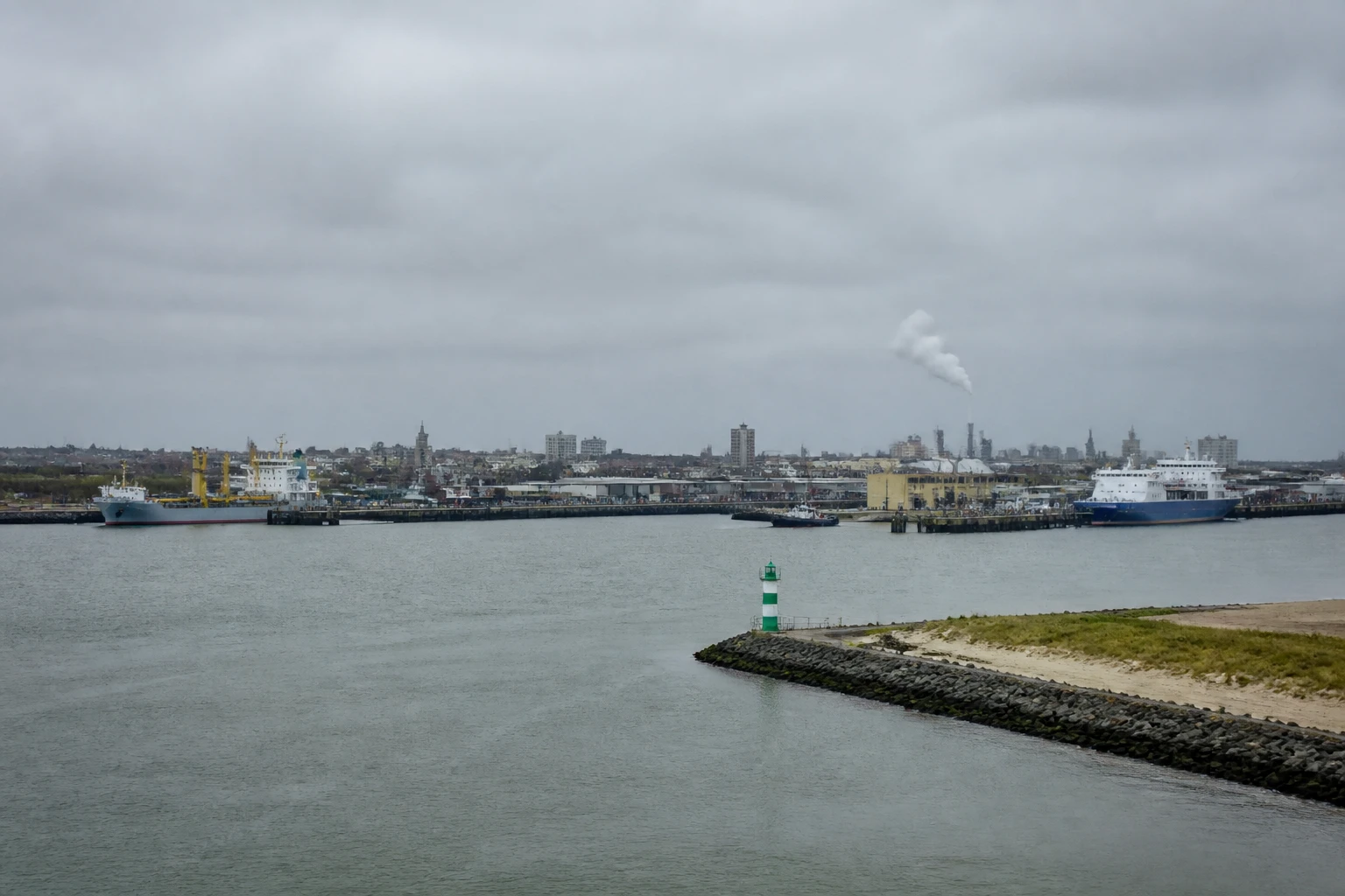 Representative cruise port destination view: Ijmuiden, Netherlands; passenger waterfront and harbor water, not an exact landmark photograph.