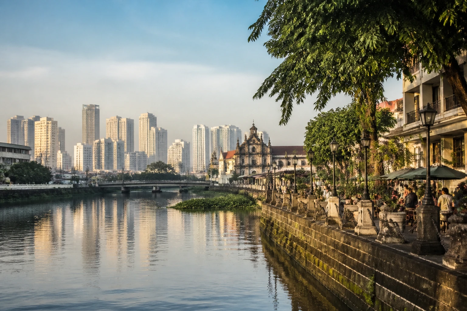 Representative city destination view: Manila, Philippines; passenger waterfront and harbor water, not an exact landmark photograph.