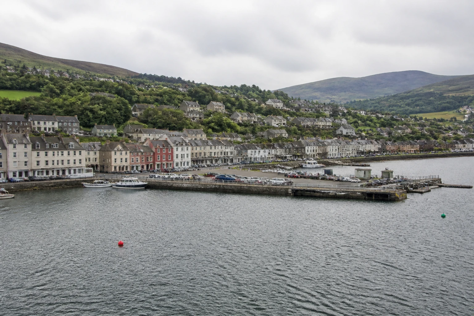 Representative cruise port destination view: Bantry, Ireland; passenger waterfront and harbor water, not an exact landmark photograph.