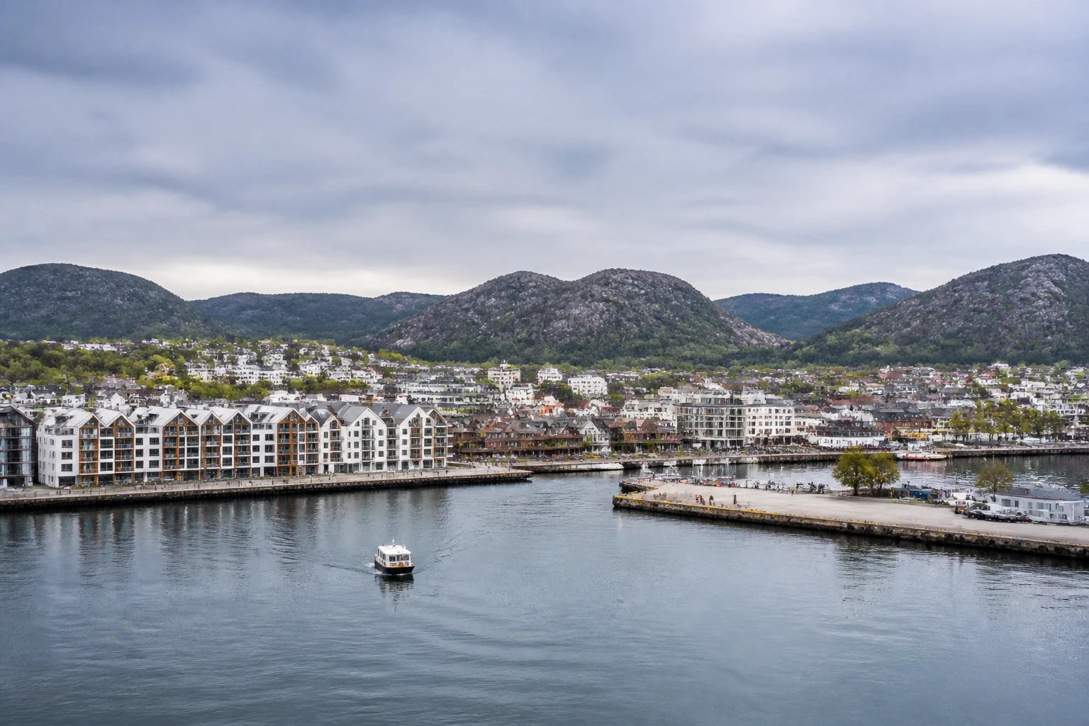 Representative cruise port destination view: Sandnes, Norway; passenger waterfront and harbor water, not an exact landmark photograph.