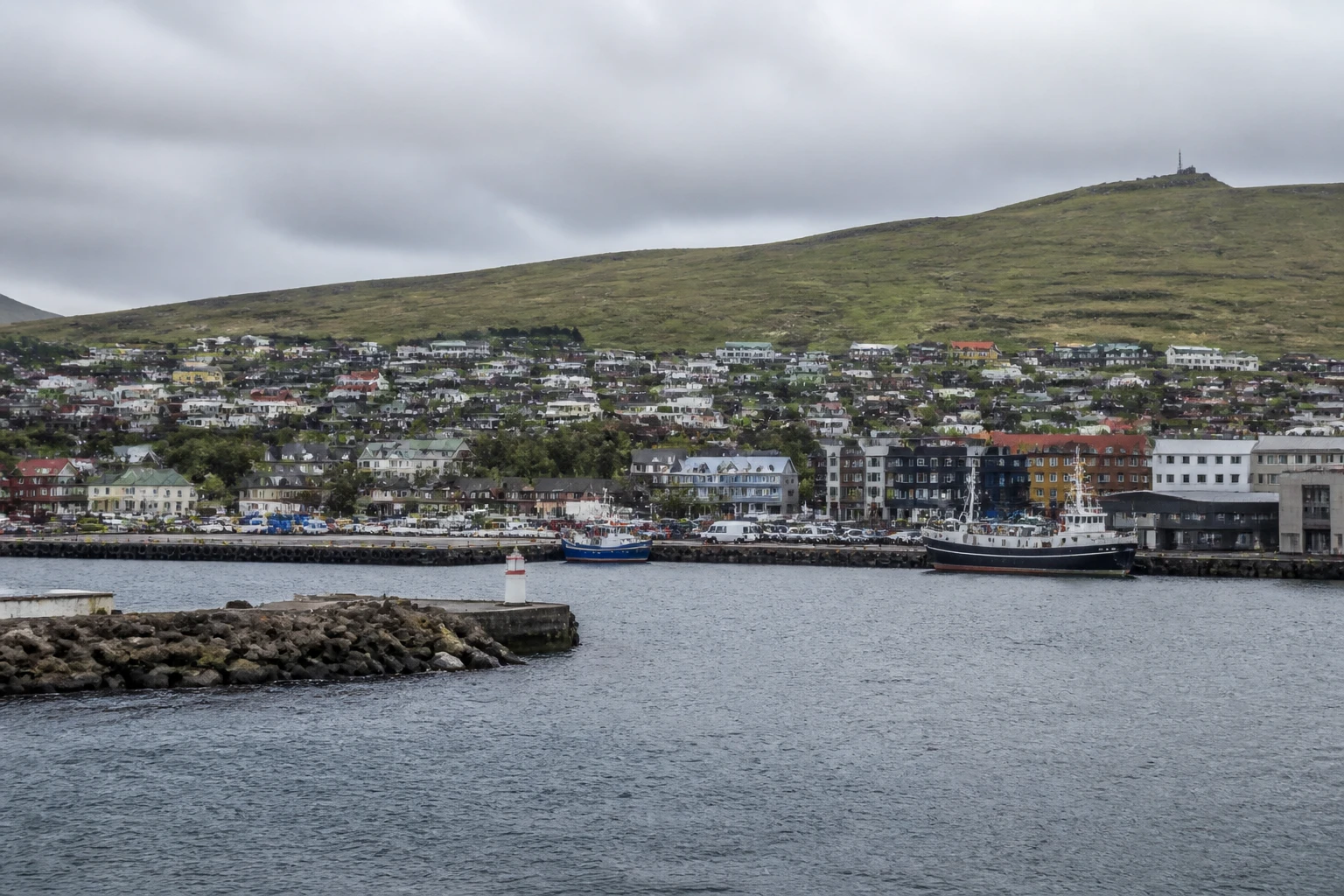 Representative cruise port destination view: Torshavn, Faroe Islands; passenger waterfront and harbor water, not an exact landmark photograph.