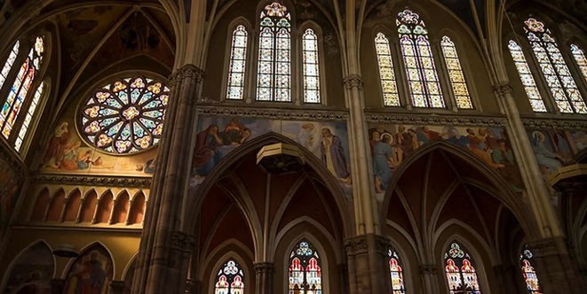 Historic church towers and surrounding architecture in Osijek, Croatia.