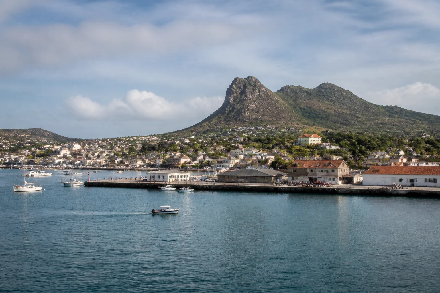 Representative cruise port destination view: Diego Suarez, Madagascar; passenger waterfront and harbor water, not an exact landmark photograph.