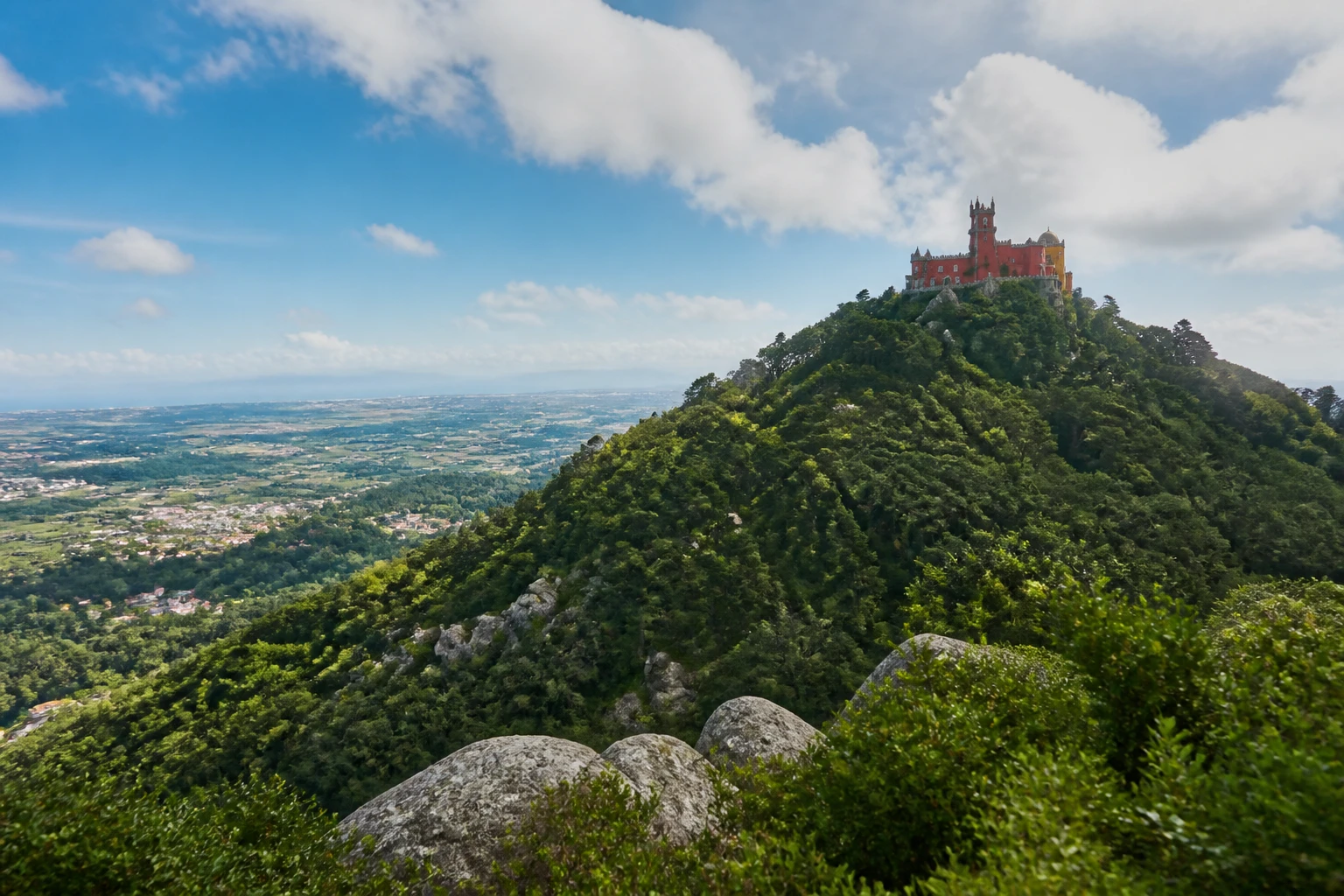 Representative nature destination overview of Sintra in Portugal, showing regional terrain, vegetation, and natural light rather than an exact landmark view.