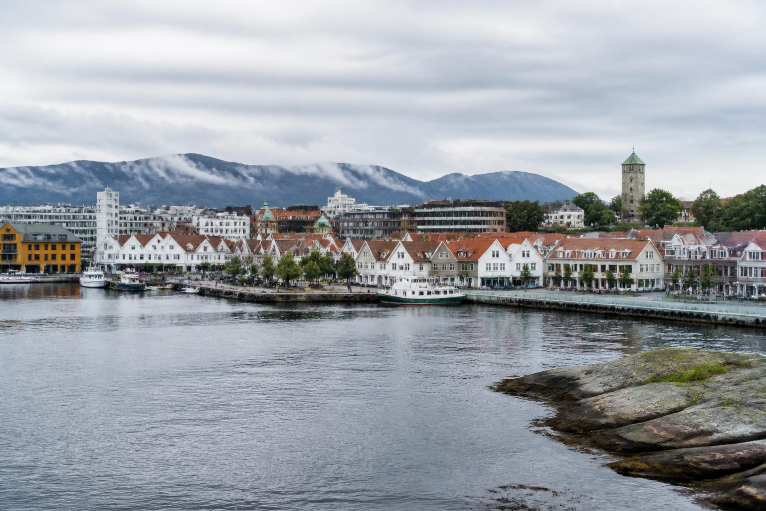 Representative cruise port destination view: Stavanger, Norway; passenger waterfront and harbor water, not an exact landmark photograph.