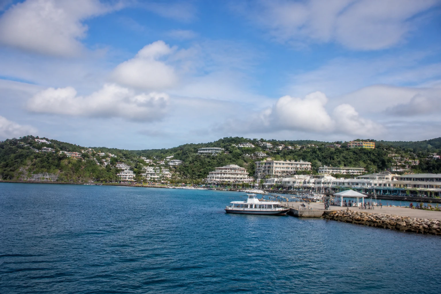 Representative cruise port destination view: Port-Vila, Vanuatu; passenger waterfront and harbor water, not an exact landmark photograph.
