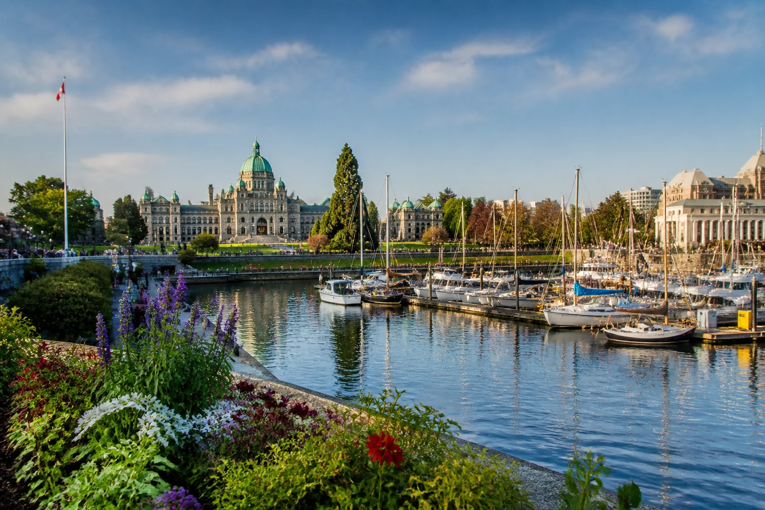 Representative city destination view: Victoria, British Columbia, Canada; passenger waterfront and harbor water, not an exact landmark photograph.