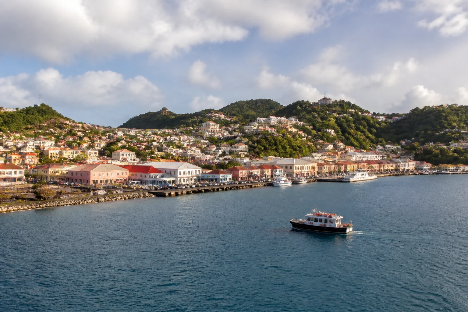 Representative cruise port destination view: St. George's, Grenada; passenger waterfront and harbor water, not an exact landmark photograph.