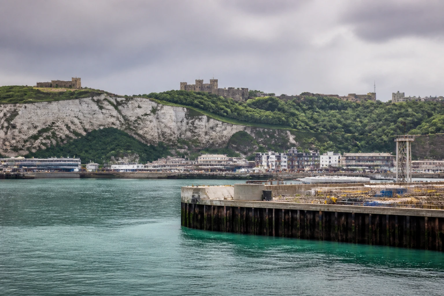 Representative cruise port destination view: Dover, United Kingdom; passenger waterfront and harbor water, not an exact landmark photograph.