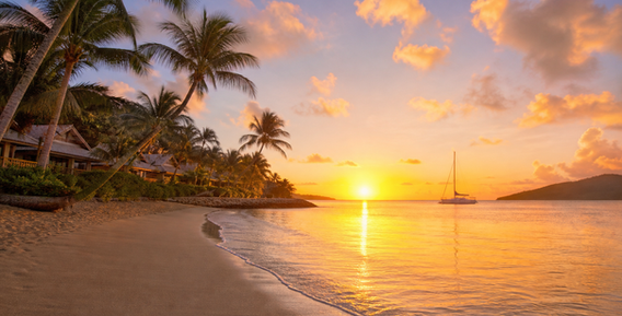 Representative sunrise imagery for a Sandals Halcyon Beach destination wedding in Saint Lucia