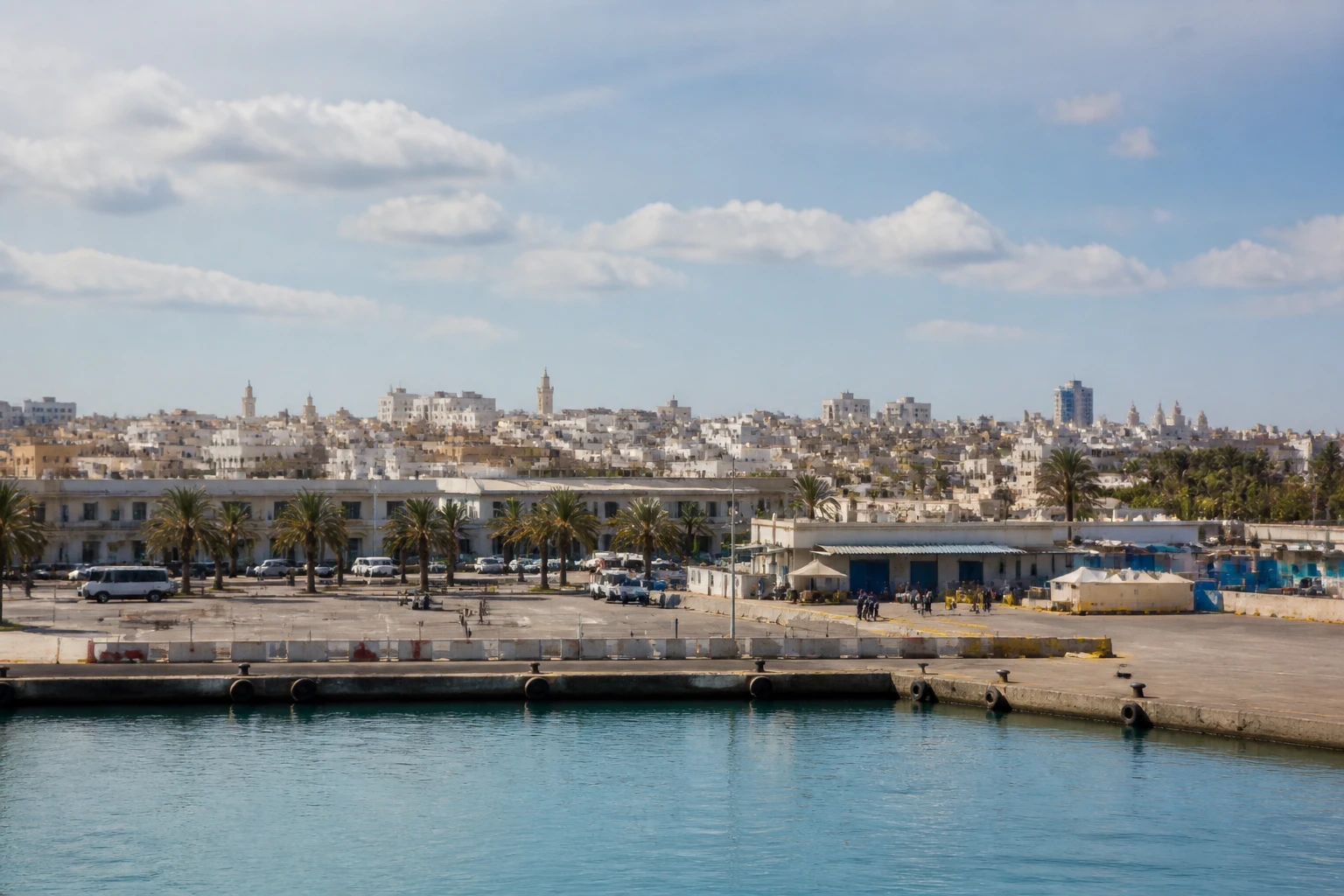 Representative cruise port destination view: Tunis; passenger waterfront and harbor water, not an exact landmark photograph.