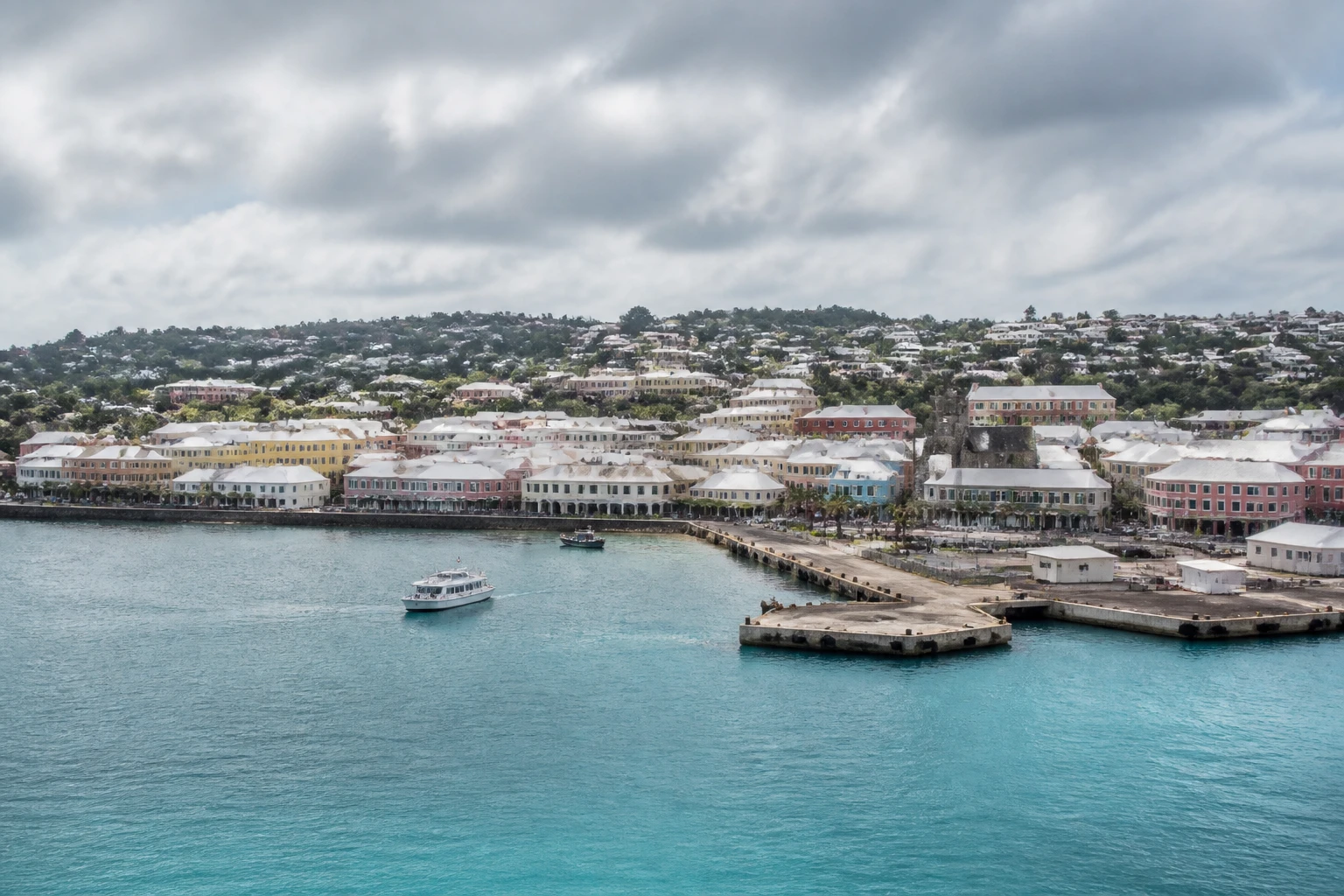 Representative cruise port destination view: St. George's, Bermuda; passenger waterfront and harbor water, not an exact landmark photograph.