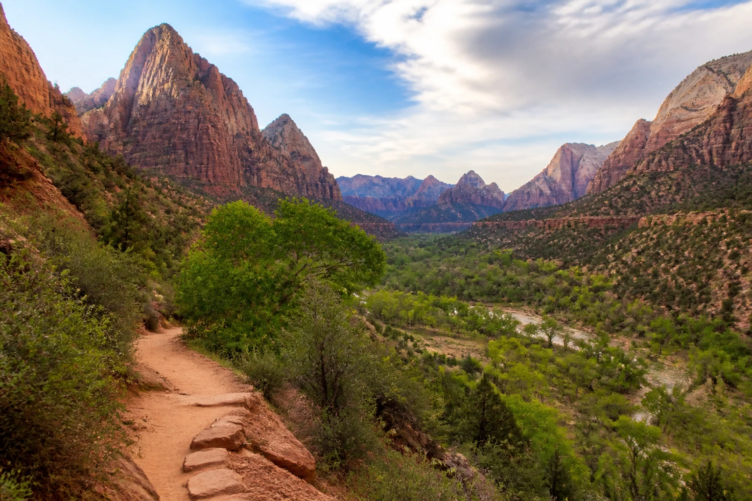 Representative national park destination view: Zion National Park, United States; protected terrain and native vegetation, not an exact landmark photograph.