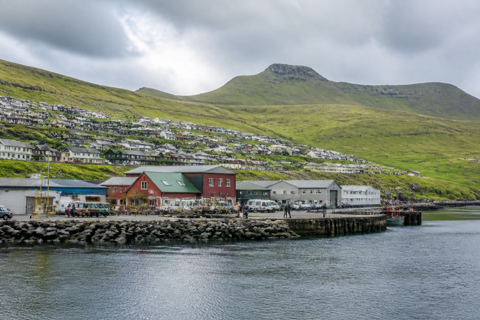 Representative cruise port destination view: Runavik, Faroe Islands; passenger waterfront and harbor water, not an exact landmark photograph.