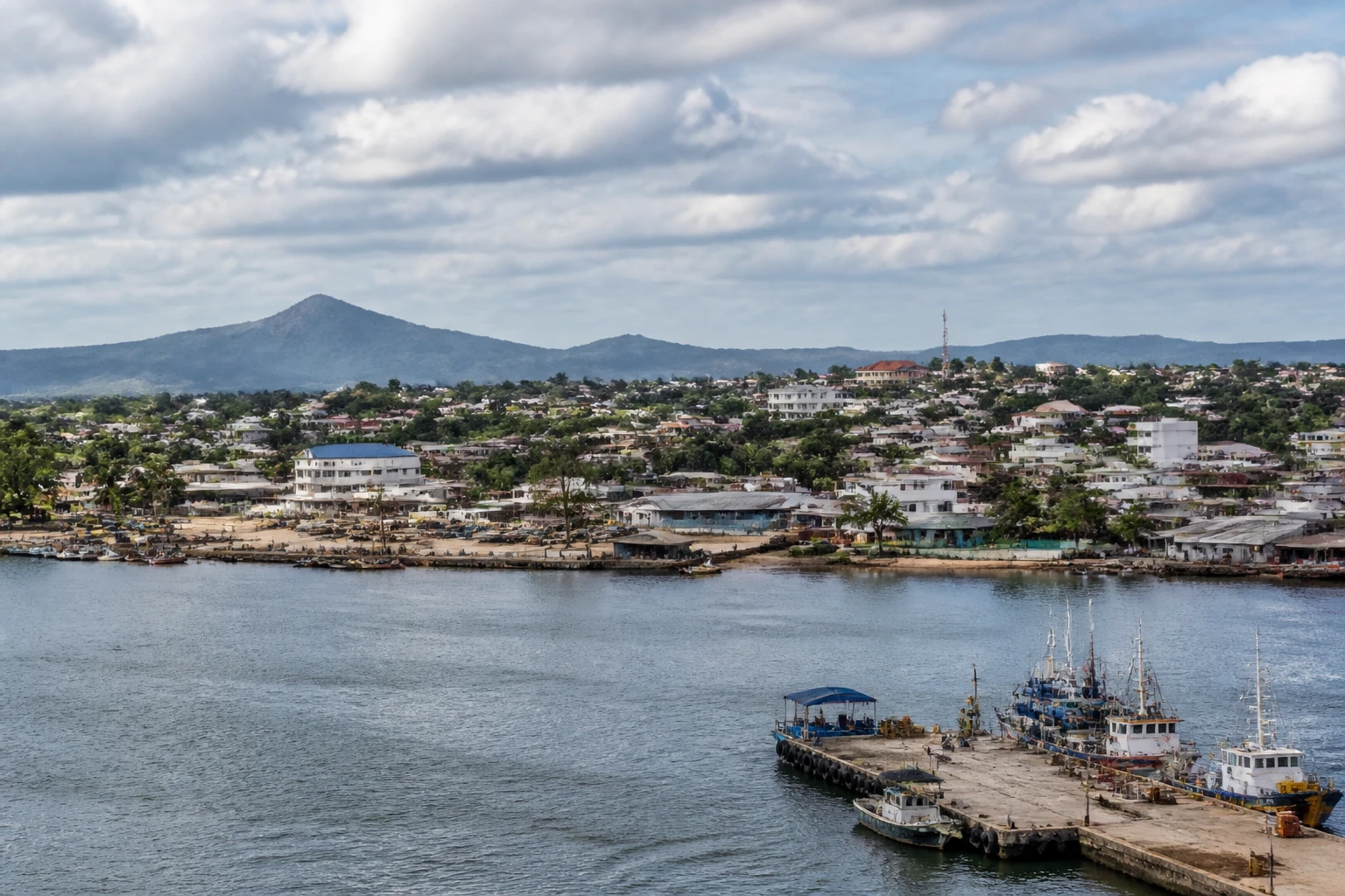 Representative cruise port destination view: Fort Dauphin, Madagascar; passenger waterfront and harbor water, not an exact landmark photograph.