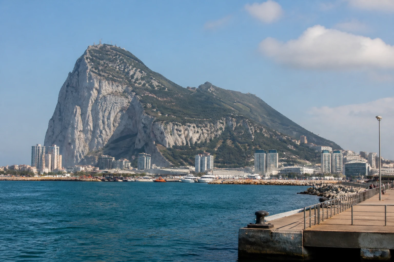 Representative cruise port destination view: Gibraltar; passenger waterfront and harbor water, not an exact landmark photograph.