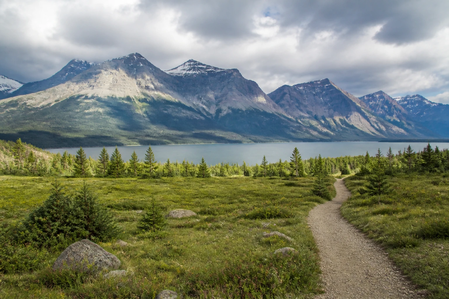 Representative national park destination view: Jasper National Park, Canada; protected terrain and native vegetation, not an exact landmark photograph.