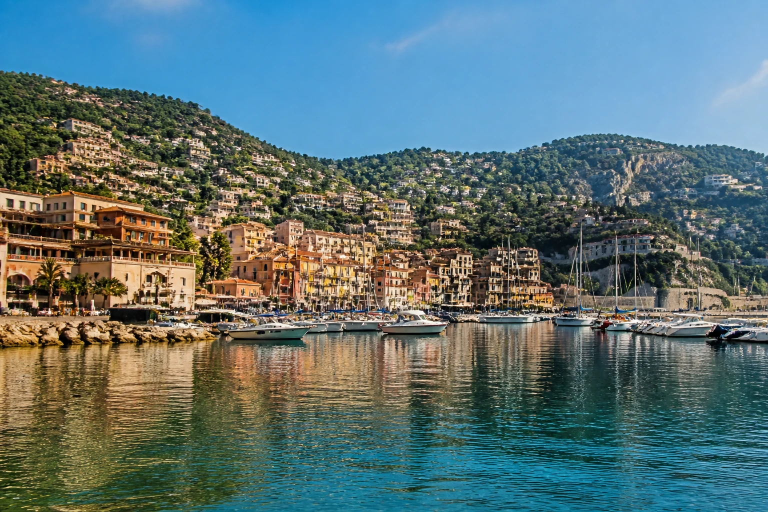 Representative cruise port destination view: Villefranche-sur-Mer, France; passenger waterfront and harbor water, not an exact landmark photograph.