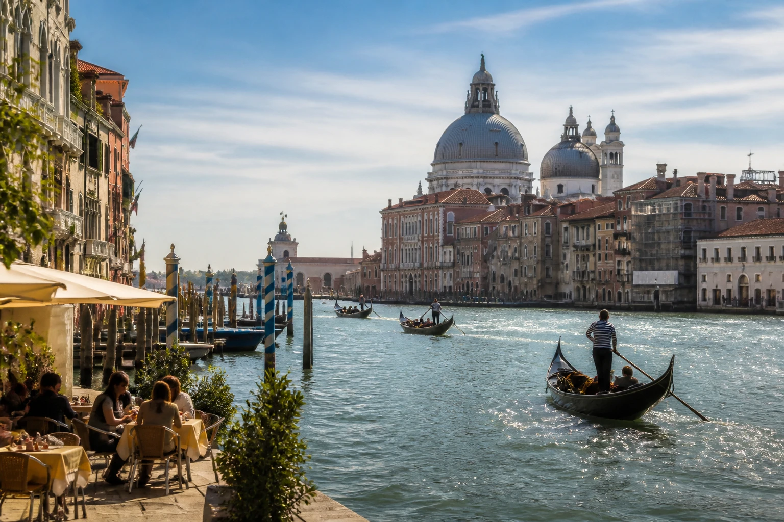 Representative city destination view: Venice, Italy; passenger waterfront and harbor water, not an exact landmark photograph.
