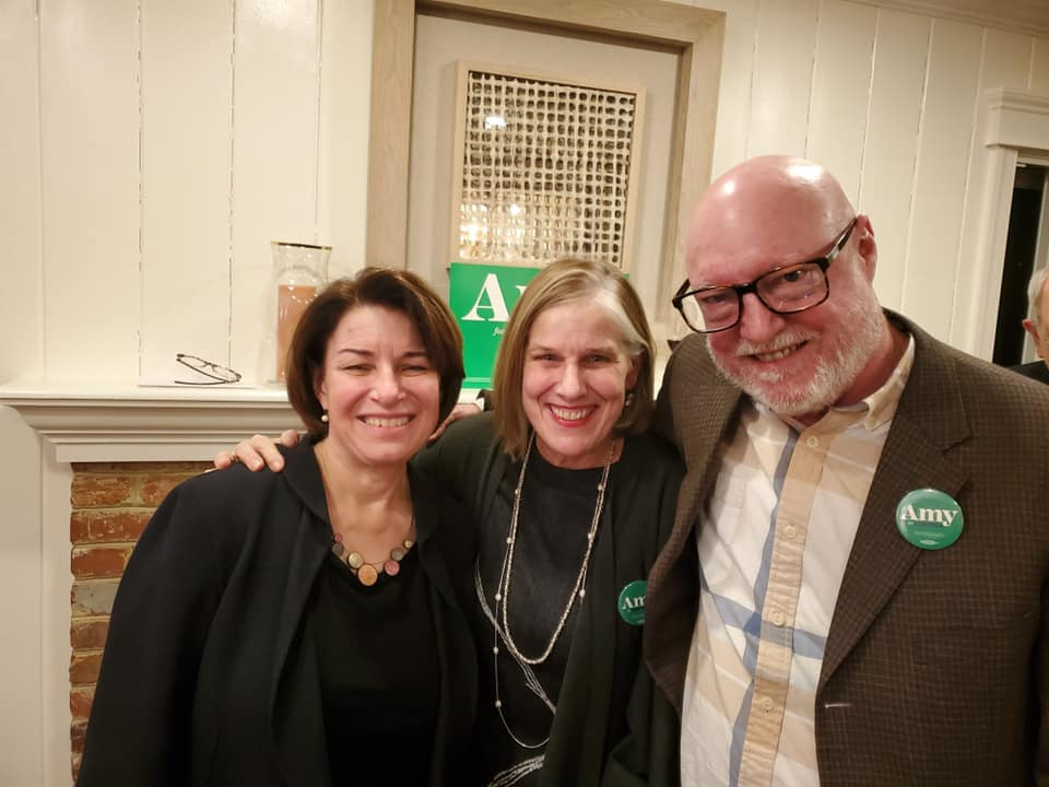 Three adults at a fundraiser for presidential candidate: Amy Klobuchar, Martha Thomas and Chris Rigaux
