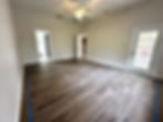 tile flooring installed all throughout house showing the new floor installed in the master bedroom