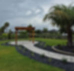 pergola at the end of a walkway