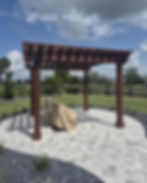 Custom Cut Pergola on pavers, newly stained and custom cut tails