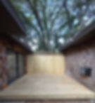 new privacy fence in-between houses with a new deck