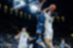 George Washington III playing basketball at the University of Michigan