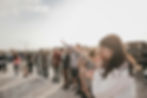 Gathered group of young adults praying for America