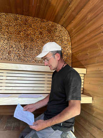 Technician installing sauna