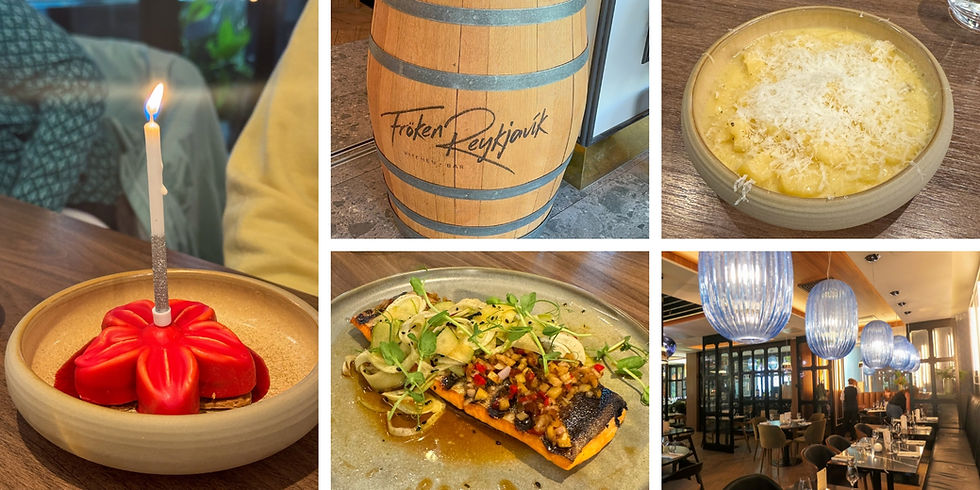 Red dessert with candle, creamy dish, salmon meal, wooden barrel with text, and elegant dining area with blue lamps. Cozy atmosphere.