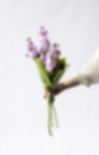 Handheld bouquet of Stocks