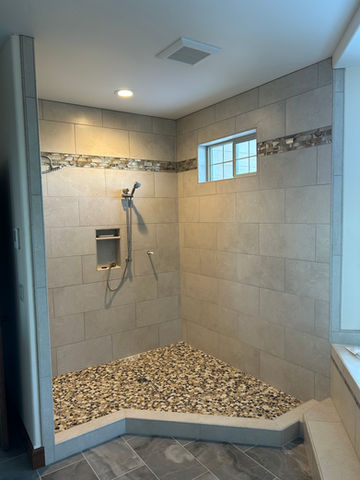 Custom shower in bathroom with tile masonry in Sandpoint Idaho.