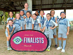 FIERCE Academy Pink with their medals