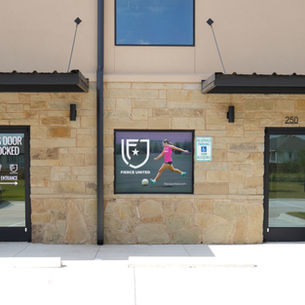 Door and window artwork next to the FIERCE Futsal Facility entrance