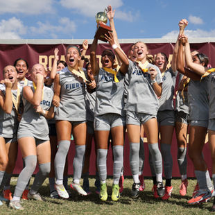 FIERCE G08 players lifting the trophy