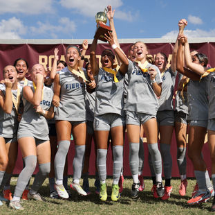 FIERCE G08 players lifting the trophy