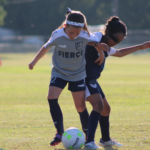 FIERCE Academy player shielding the ball