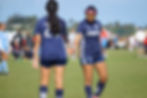 Two FIERCE players exchange a high-five