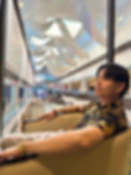 Professional dating app photoshoot in Las Vegas featuring a confident man in an upscale lounge setting, styled for high-quality dating profiles