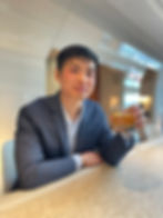 Man smiling in natural light portrait example for Tinder profile photo