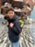 Man carrying dog in backpack lifestyle Tinder profile photo example