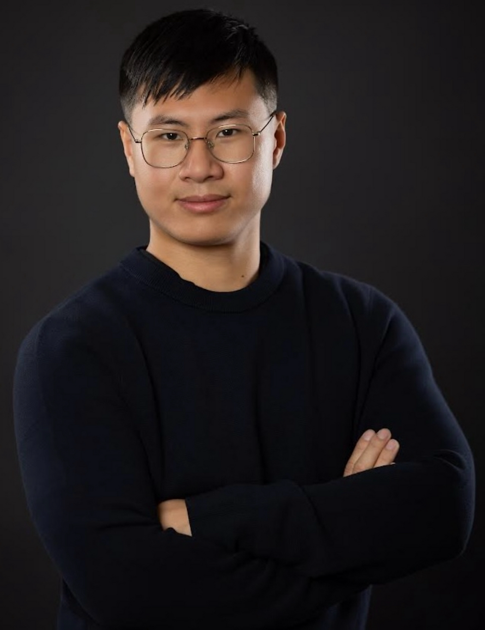 Casual studio headshot of a man before working with a Chicago dating app photographer