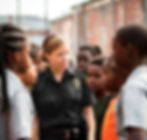 A Security Woman Discussing Any Security Issues With The Students